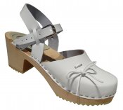 Mary Jane - White patent leather on a natural high (7 cm) base, white leather bow